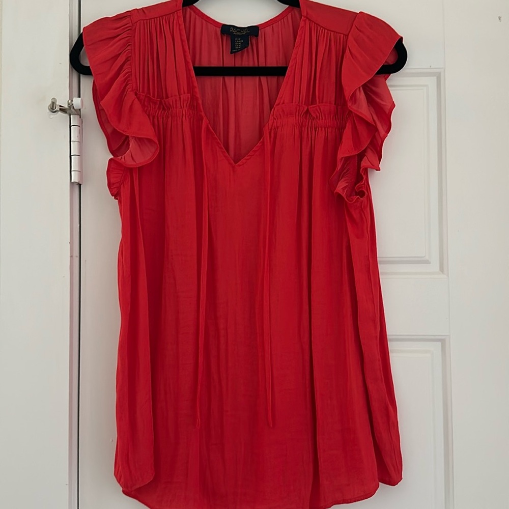 Red/ orange shirt